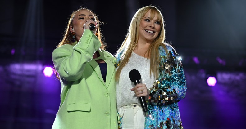 Natasha Hamilton (left) and Liz McClarnon (right) performing as Atomic Kitten