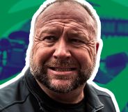 Alex Jones infront of an edited picture of The Onion logo.