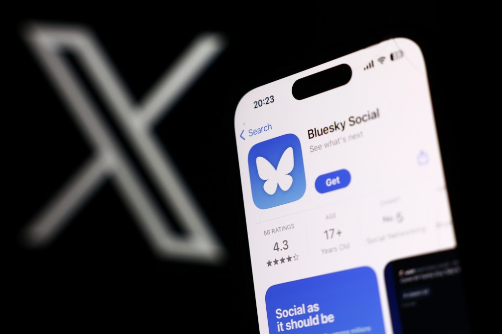 X logo displayed on a laptop screen and Bluesky Social on App Store displayed on a phone screen