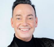 A portrait of Craig Revel Horwood smiling.