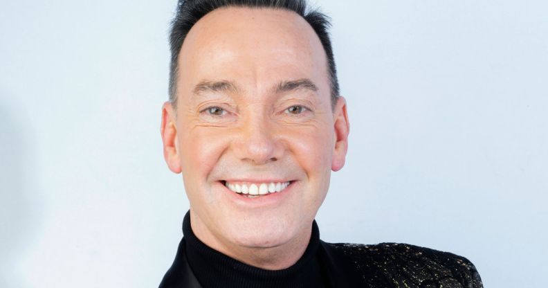 A portrait of Craig Revel Horwood smiling.