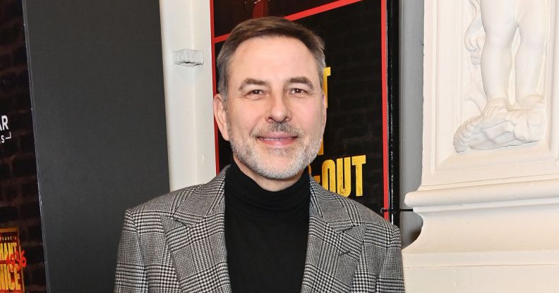 David Walliams outside a London theatre in february 2024 smiling