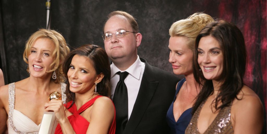 Marc Cherry (centre) with the cast of Desperate Housewives in 2006