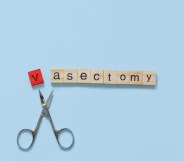 Scrabble letters spelling out 'vasectomy' with a scissor between the 'v' and 'a'.