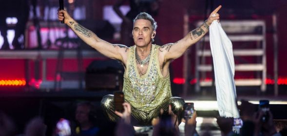 Robbie Williams teases UK and European tour announcement.