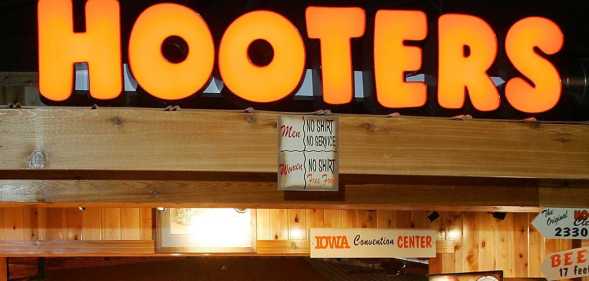 The entrance to a Hooters Restaurant.