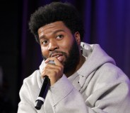 LOS ANGELES, CALIFORNIA - OCTOBER 14: Khalid speaks onstage at Spotlight: Khalid at GRAMMY Museum L.A. Live on October 14, 2024 in Los Angeles, California. (Photo by Rebecca Sapp/Getty Images for The Recording Academy)