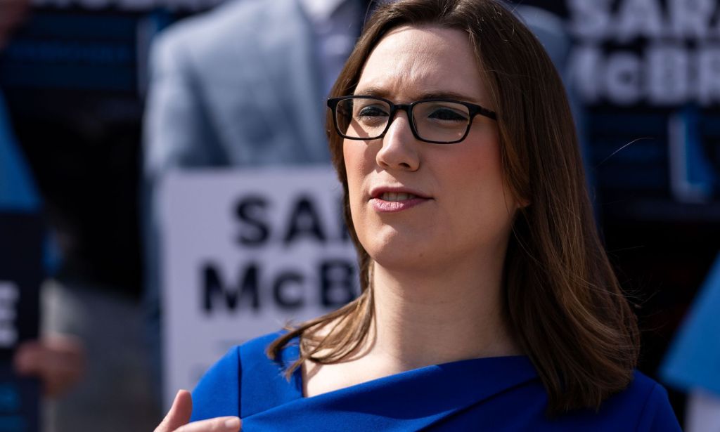 Sarah McBride speaking at a rally.