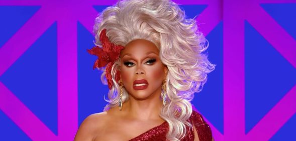 RuPaul at the judges table on drag race uk