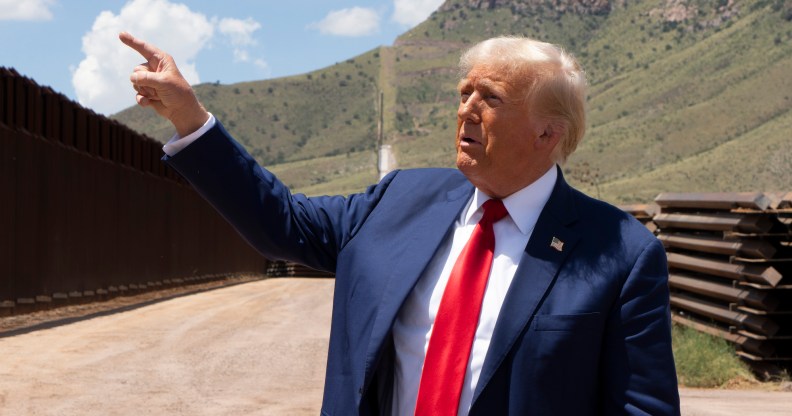 SIERRA VISTA, ARIZONA - AUGUST 22: Republican Presidential Candidate and former President Donald Trump walks along the U.S.-Mexico border on August 22, 2024 south of Sierra Vista, Arizona. Trump will hold a rally in Glendale, Arizona tomorrow. (Photo by Rebecca Noble/Getty Images)