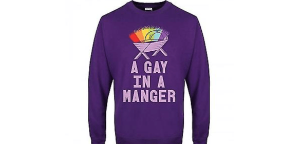 A purple Christmas jumper with a rainbow over a crib and the text 'a gay in a manger' from Debenhams