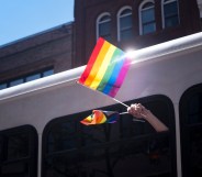 Pride flag waving out of a bus in Oregon