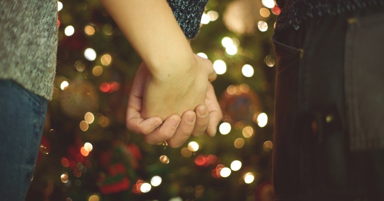 Couple holding hands.