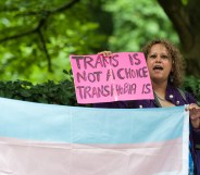 A group of demonstrators gather in front of the US Embassy to protest against Donald Trump's latest announcement that transgender troops will not be allowed to serve in any capacity in the US military on July 28, 2017 in London, England.