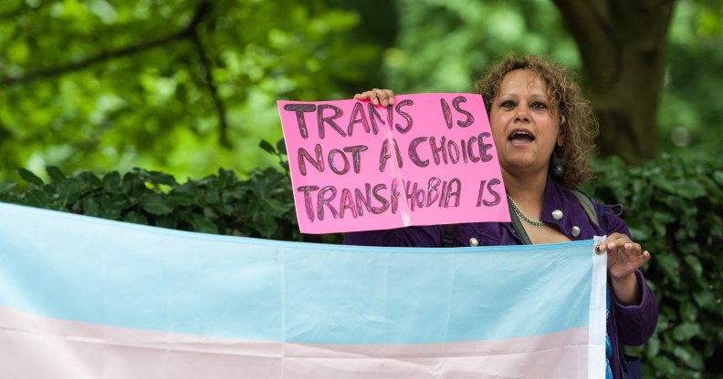 A group of demonstrators gather in front of the US Embassy to protest against Donald Trump's latest announcement that transgender troops will not be allowed to serve in any capacity in the US military on July 28, 2017 in London, England.