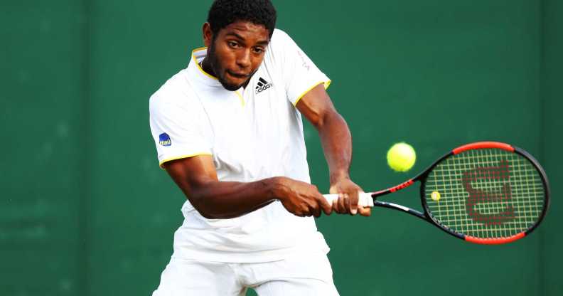 Joao Lucas Reis Da Silva of Brazil plays a backhand in his Boys' Singles first round match on day seven of the Wimbledon Lawn Tennis Championships at All England Lawn Tennis and Croquet Club on July 9, 2018 in London, England.