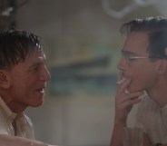 Daniel Craig as Lee facing Drew Starkey's Eugene smoking.