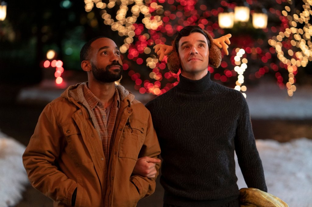 Single All The Way; two men with locked arms looking up at Christmas lights