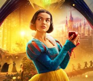 Rachel Zegler as Snow White in Disney's live action film poster, holding a red apple