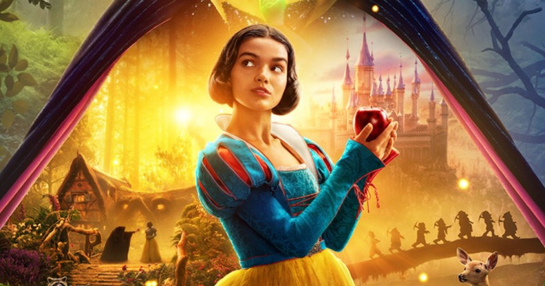 Rachel Zegler as Snow White in Disney's live action film poster, holding a red apple