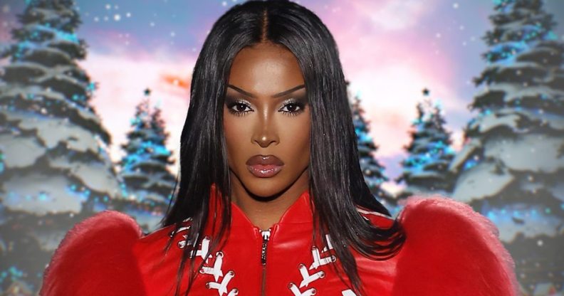 Tayce in a red, puffy sleeved dress, against a snowy background