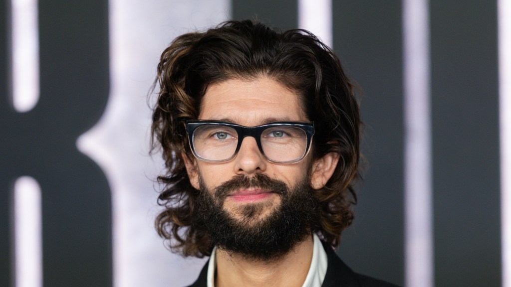 Ben Whishaw posing on the red carpet.