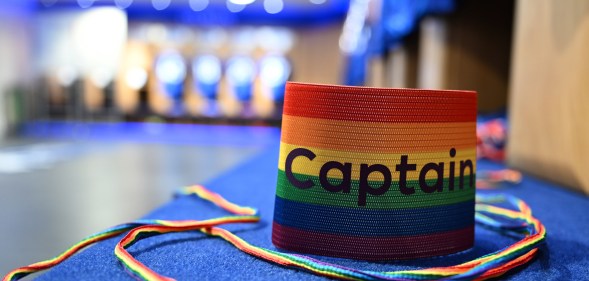 rainbow laces and rainbow 'Captain' armband from the FA's Rainbow Laces campaign inside a team locker room