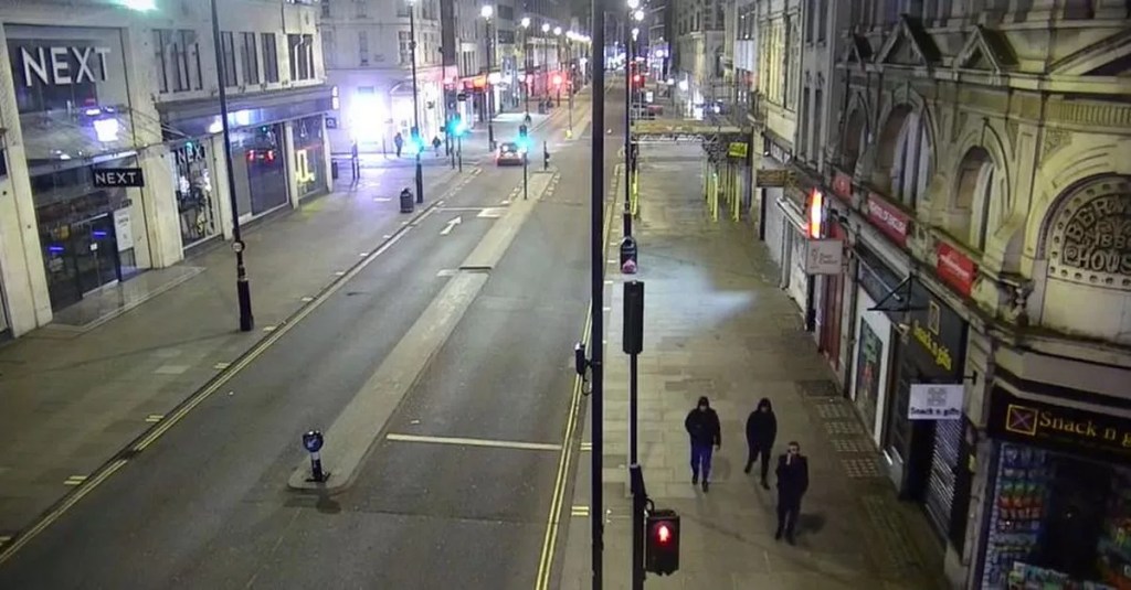 three men walking in Soho on the same day Heklina died