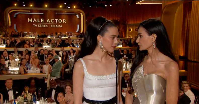 Demi Moore and Margaret Qualley on stage at the 82nd Golden Globes