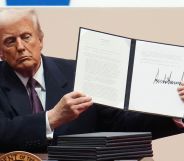 US President Donald Trump holds up an executive order after signing it during an indoor inauguration parade at Capital One Arena on January 20 2025 in Washington, DC