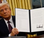 US President Donald Trump holding up an executive order after his inauguration on Monday 20 January 2025