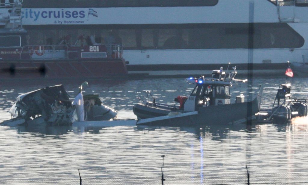 Rescue operation near the hull of a plane in the Potomac River.