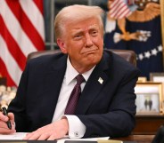 US President Donald Trump signs executive orders in the Oval Office of the White House in Washington, DC, on January 20, 2025. (Photo by Jim WATSON / AFP)