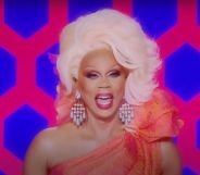 RuPaul sat behind the Drag Race judging table laughing