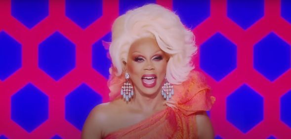 RuPaul sat behind the Drag Race judging table laughing