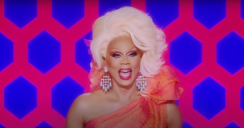 RuPaul sat behind the Drag Race judging table laughing