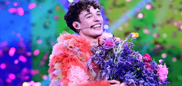 Swiss singer Nemo representing Switzerland with the song "The Code" celebrates on stage after winning the final of the 68th Eurovision Song Contest (ESC) 2024 on May 11, 2024 at the Malmo Arena in Malmo, Sweden. (Photo by Tobias SCHWARZ / AFP)