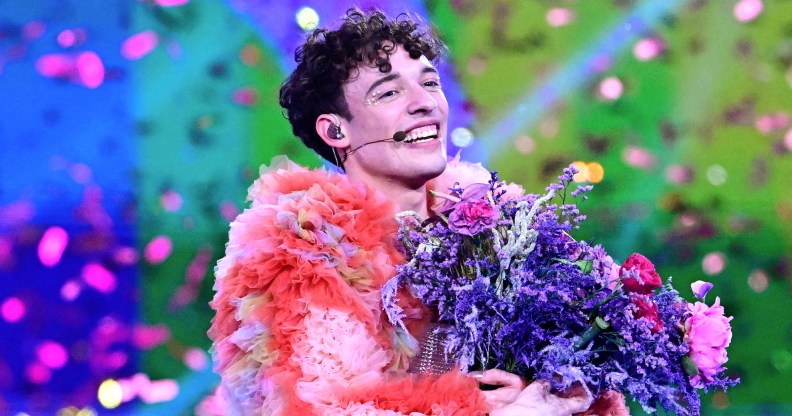 Swiss singer Nemo representing Switzerland with the song "The Code" celebrates on stage after winning the final of the 68th Eurovision Song Contest (ESC) 2024 on May 11, 2024 at the Malmo Arena in Malmo, Sweden. (Photo by Tobias SCHWARZ / AFP)