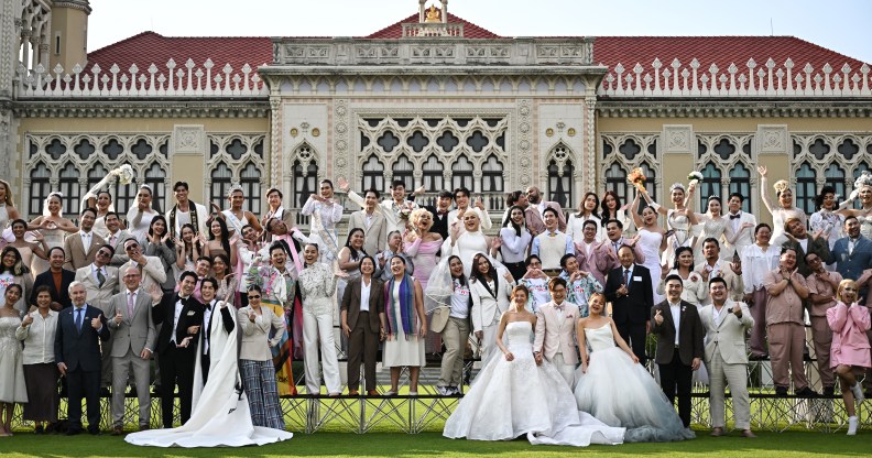 Couples and members of LGBTQ community pose for photos to promote "Marriage Equality Day" at the Government House in Bangkok on January 15, 2025.