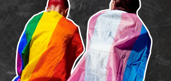 Two activists wearing Pride flags as capes.