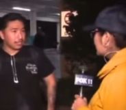 A screenshot of a man speaking to a news reporter in a yellow jacket.