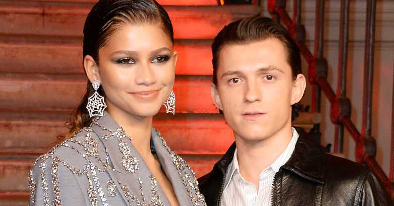 Zendaya and Tom Holland pose at a photocall for 'Spider-Man: No Way Home'.