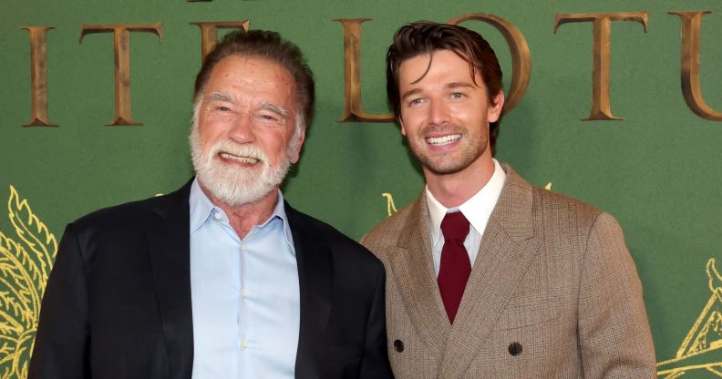 Arnold Schwarzenegger and his son Patrick smile and pose together at the premiere of The White Lotus season 3.