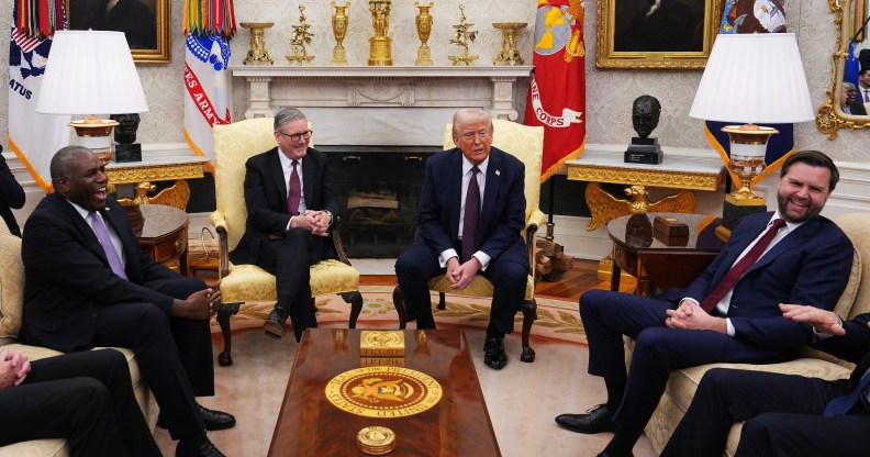 UK Prime Minister Sir Keir Starmer meets with U.S. President Donald Trump, alongside U.S. Vice President JD Vance (R) and UK Foreign Secretary David Lammy (L) in the Oval Office at the White House on February 27, 2025 in Washington, DC.