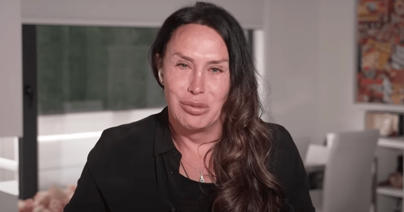 Karla Sofía Gascón breaks down in tears during an interview with CNN about past tweets