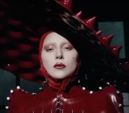 Lady Gaga in a red spiked latex hat in the music video for new single 'Abracadabra'.