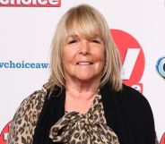 Linda Robson smiles in a leopard print dress at the TV Choice Awards