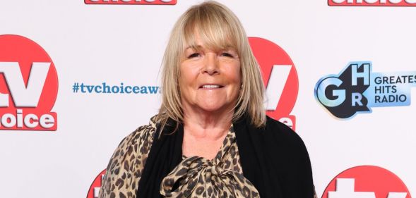 Linda Robson smiles in a leopard print dress at the TV Choice Awards