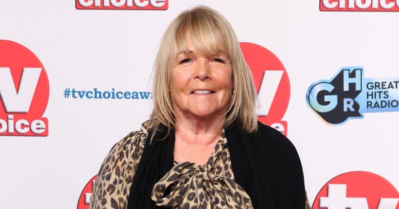 Linda Robson smiles in a leopard print dress at the TV Choice Awards