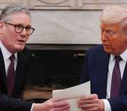 UK Prime Minister Sir Keir Starmer hands an invitation from King Charles III for a second state visit to US President Donald Trump.